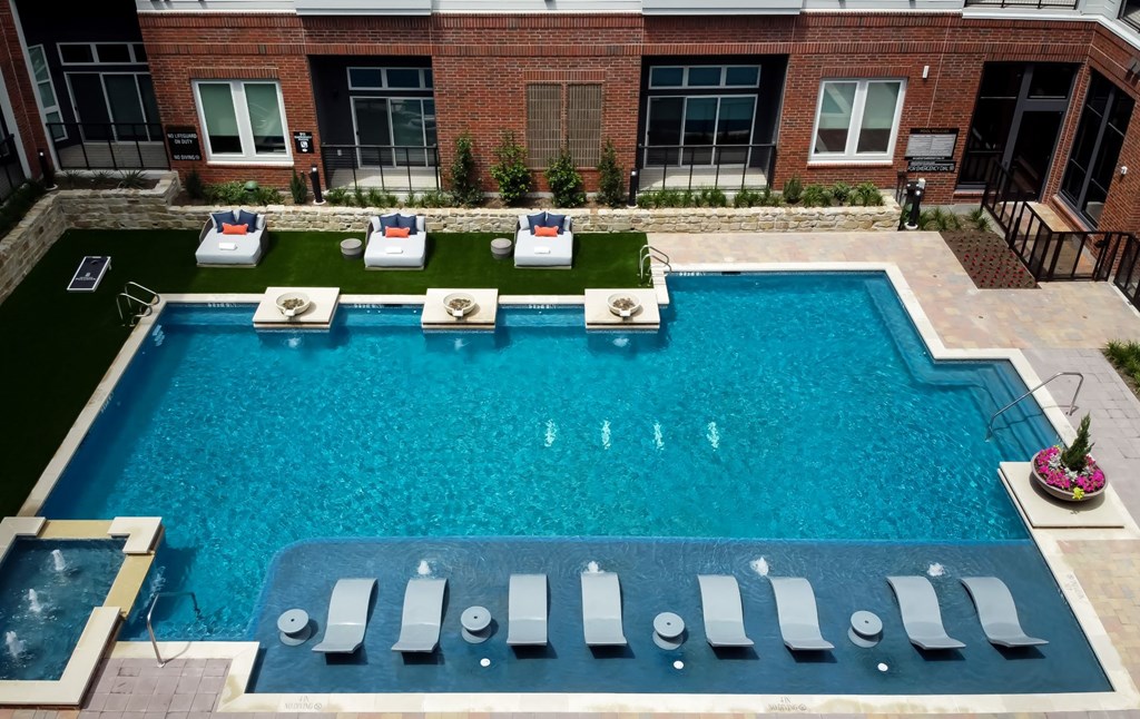 Swimming Pool With Relaxing Sundecks at Berkshire Pullman, Frisco, Texas